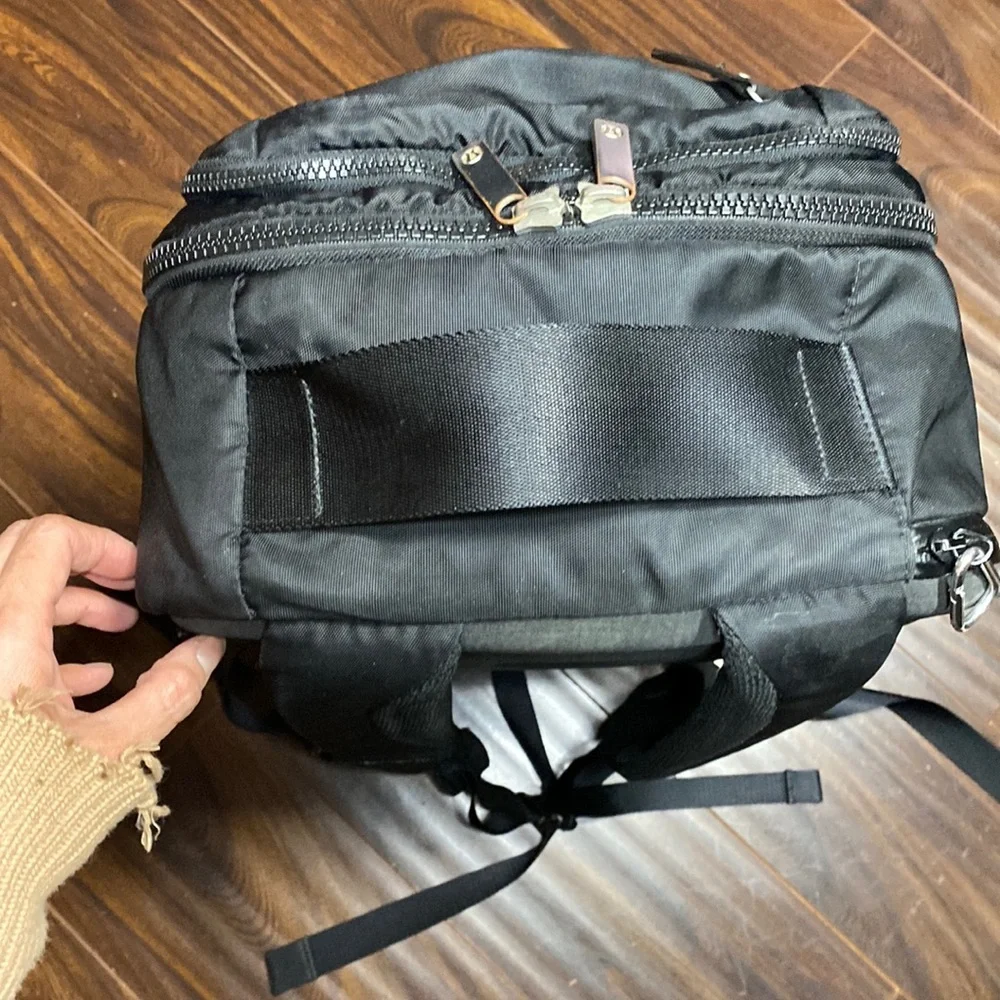lululemon athletica Navy Backpack. Solid black. Stock picture is with blue trim - Picture 9 of 16